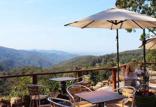 Seating on verandah overlooking Guanaba Gorge at St Bernards Hotel Mt Tamborine