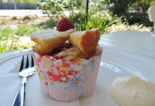 Cup cake and cream on a plate