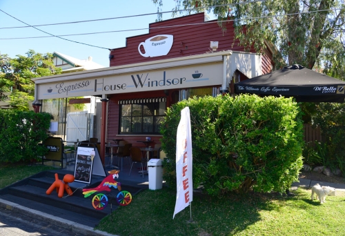 Cottage-style shop front with kids toys outside Espresso House Windsor cafe 