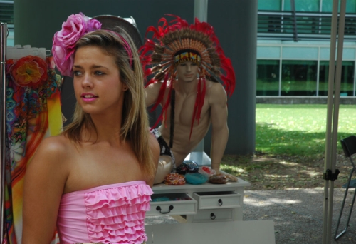 Woman in designer bikini in front of stall in the Young Designers Market South Bank