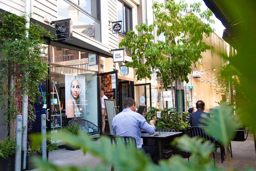 People sitting at a table in Bakery Lane 