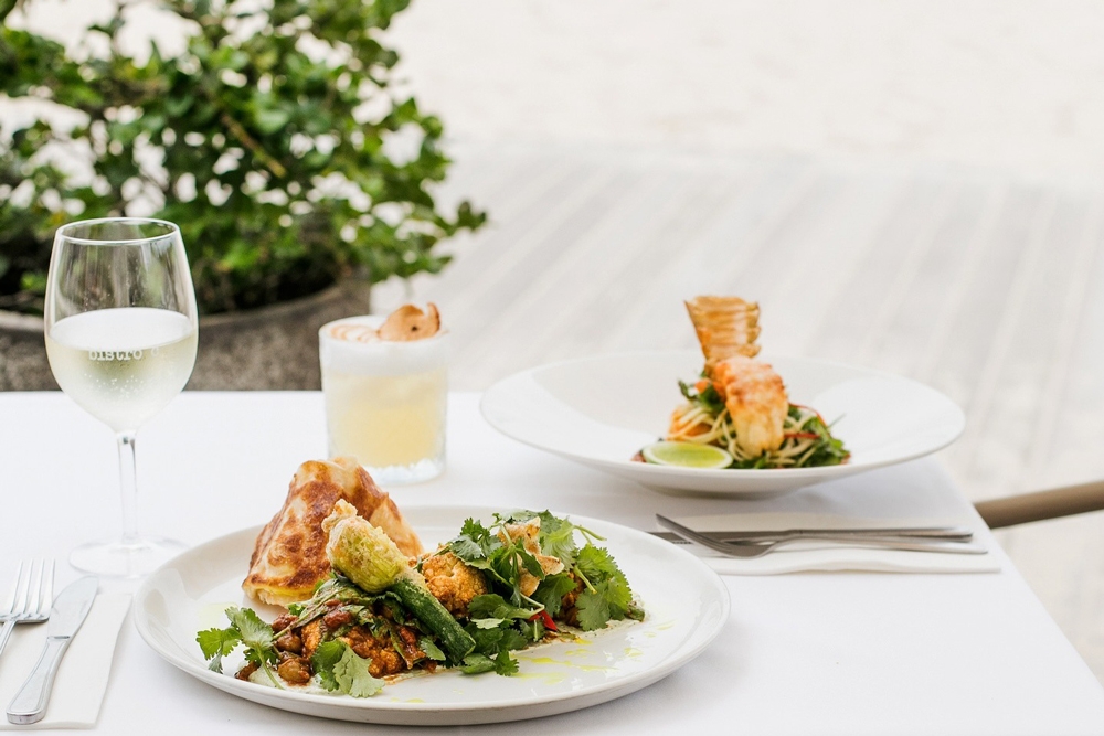 Two plates of food on a table, Bistro C, Noosa 