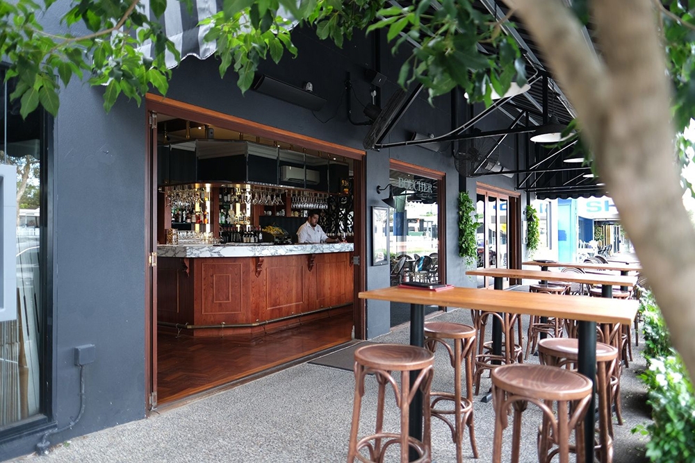 Entry and tables on street, Boucher, Graceville