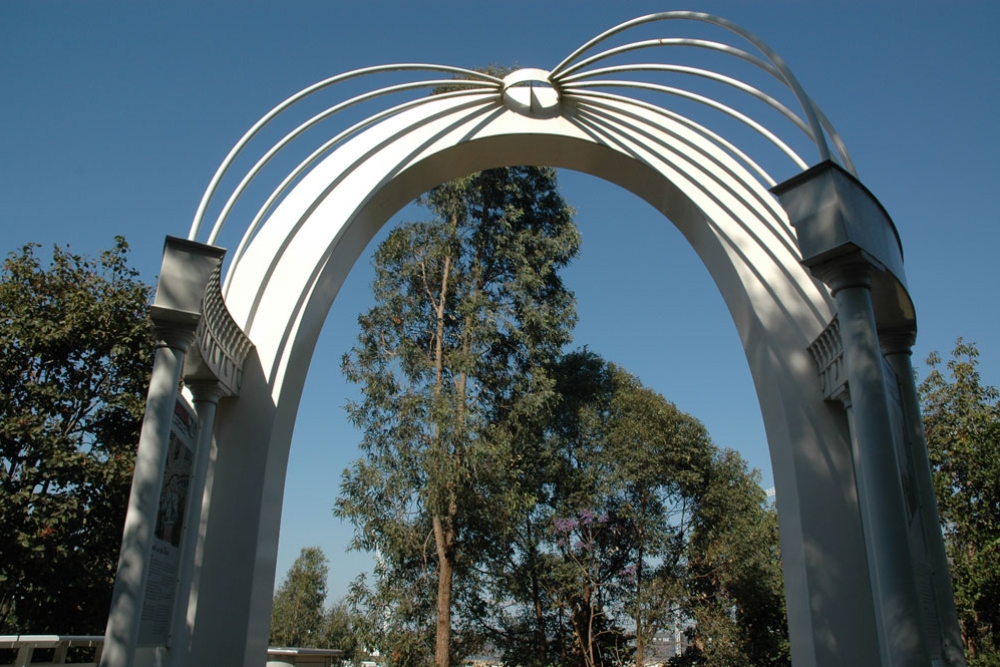 Cloudland Memorial Arch surrounded by bush in Bowen Hills