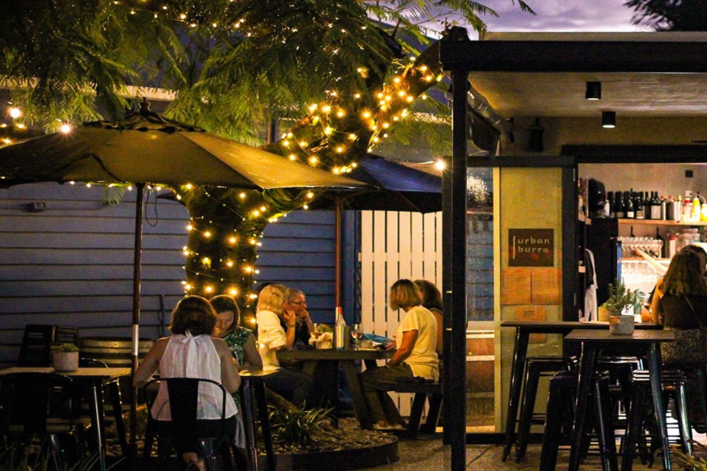 People seated outside at Urban Burro