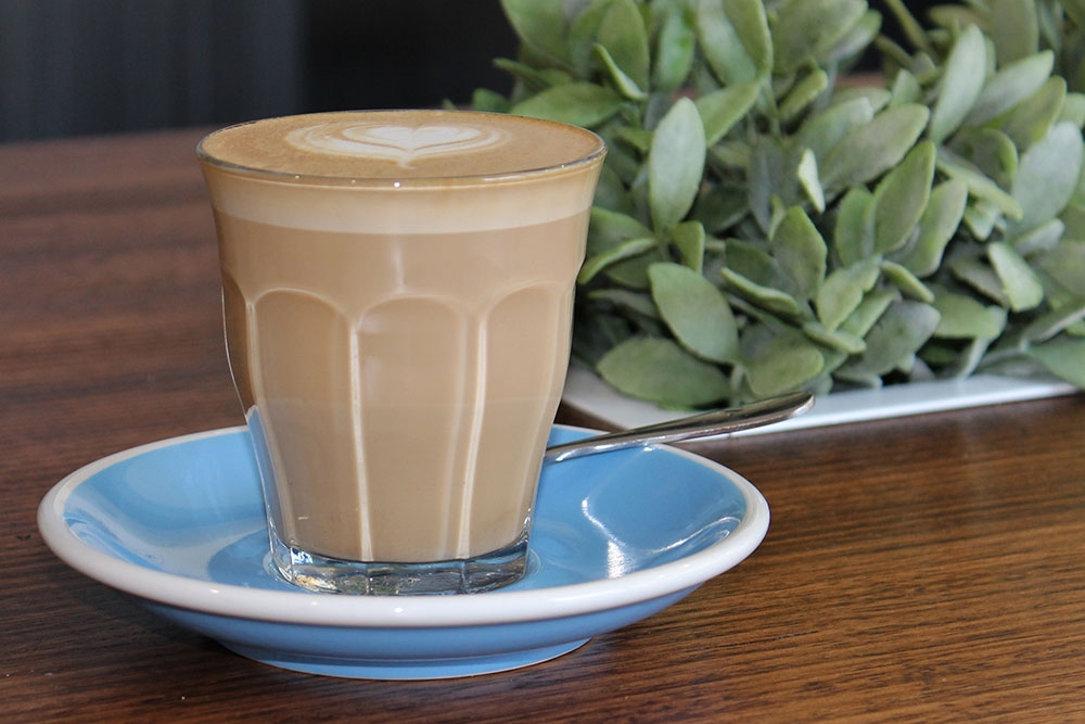 Caffe Latte in a glass at Blacksmith Specialty Coffee Mt Gravatt