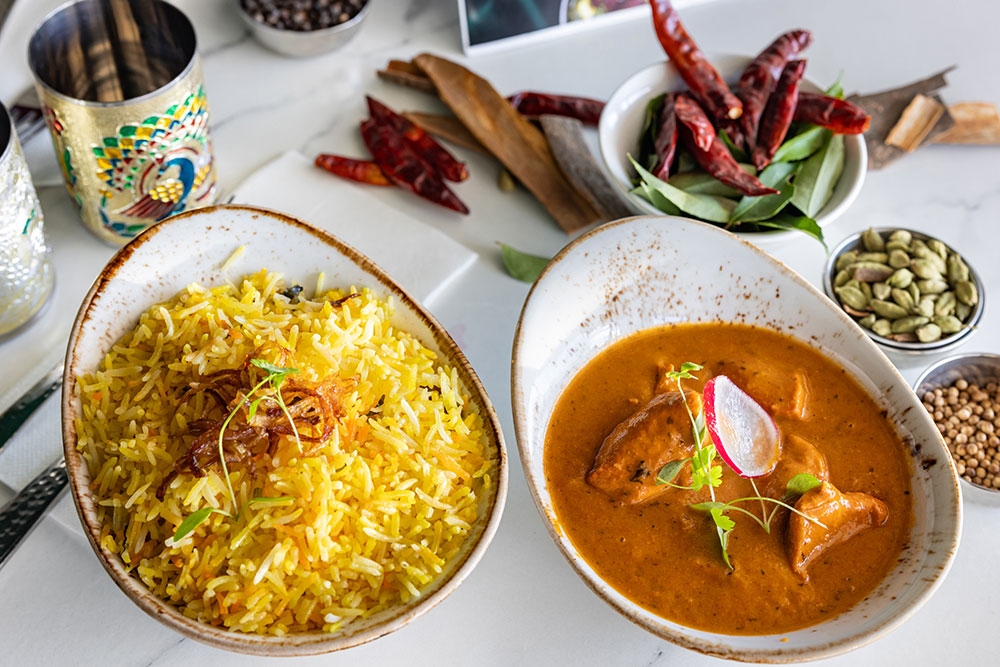 Dishes of food on table THE-KARI-INDIAN-RESTAURANT