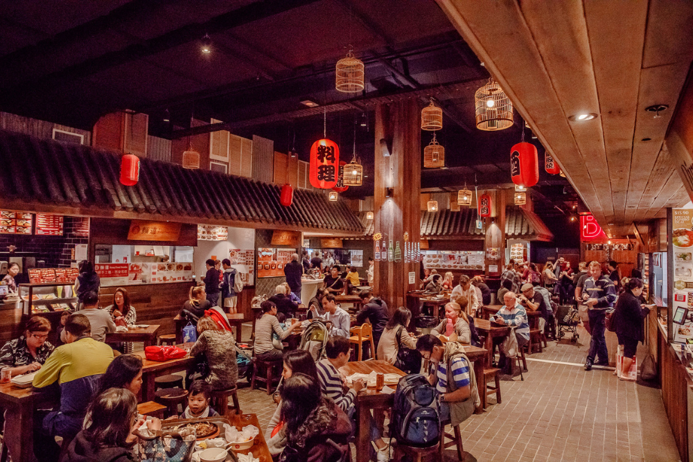 People dining inside 8 Street at Westfield Mt Gravatt