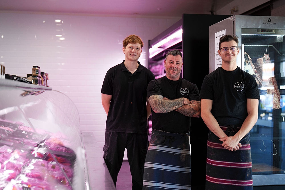 Three butchers standing inside Butcher Brothers Brendale shop