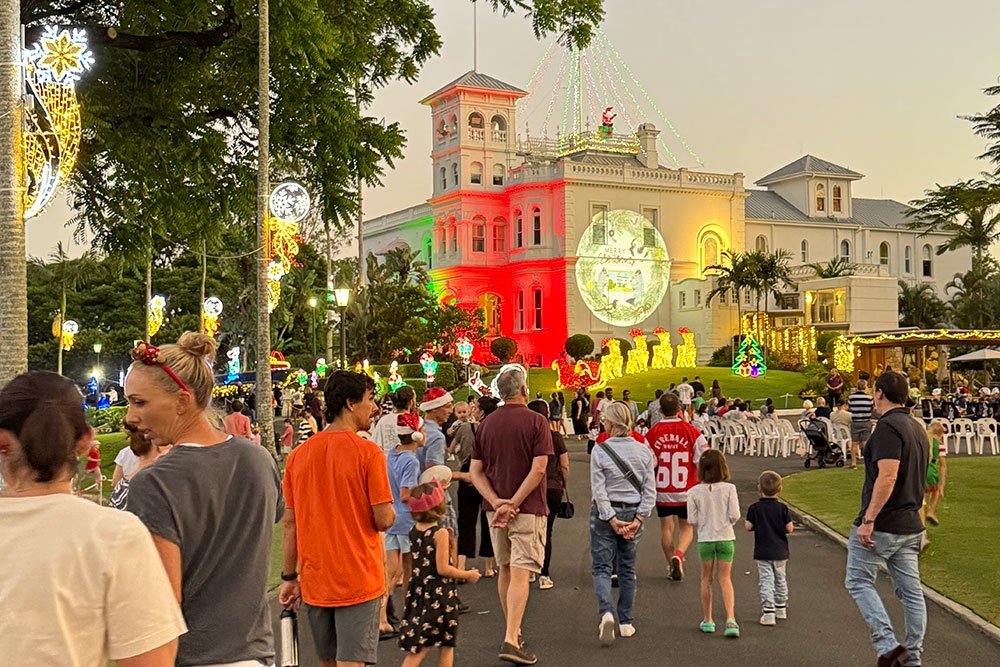 people walking up to Government House