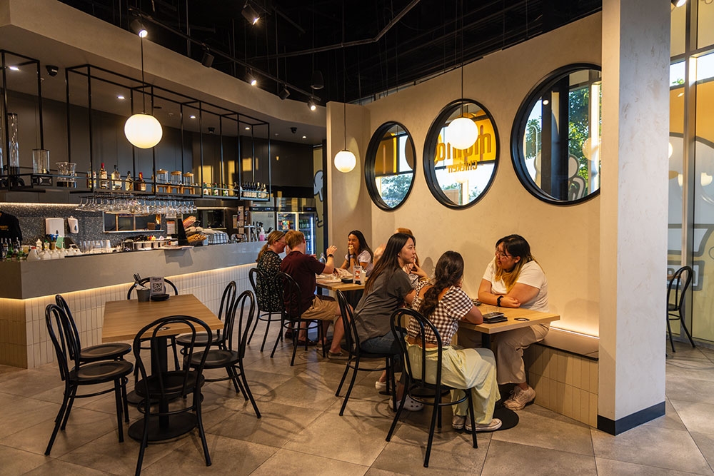 People dining at Momo Chicken Newmarket