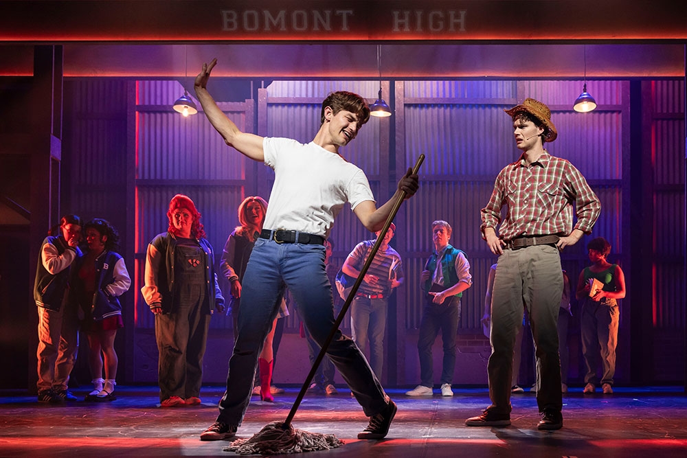 Actors on stage at Footloose The Musical