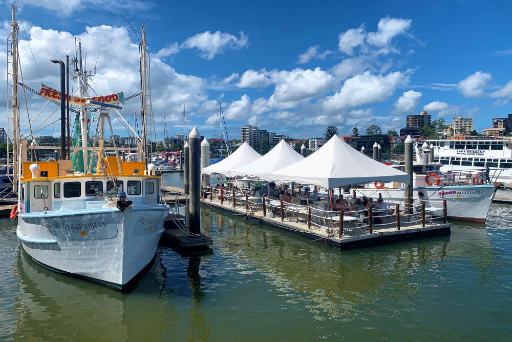 The Prawnster ex-fishing trawler afloat in Brisbane River
