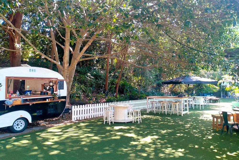 Crepe caravan at edge of garden at The Secret Garden Ferny Hills