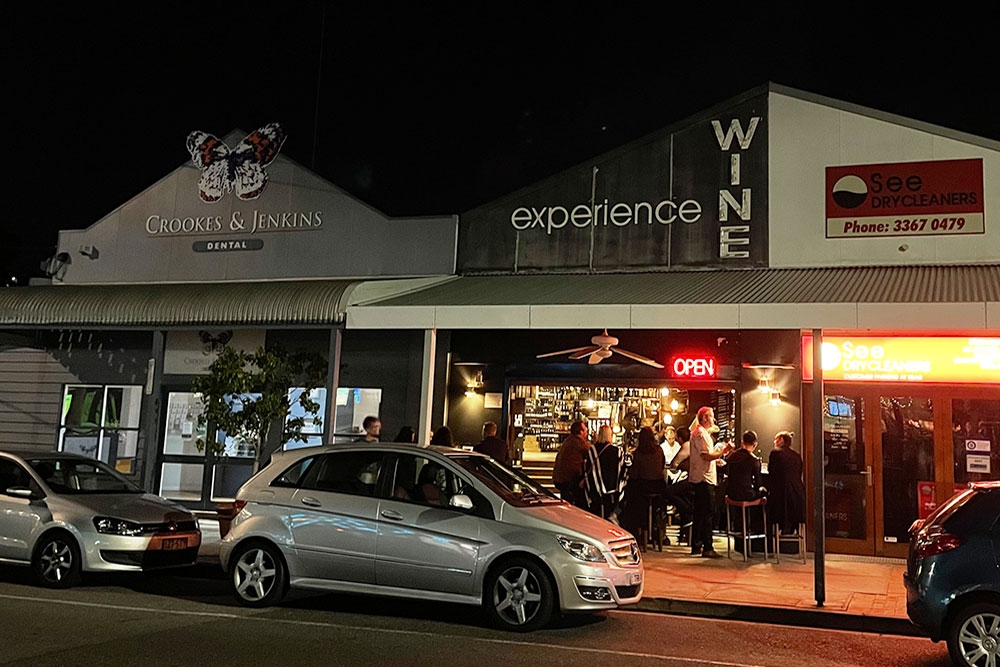 Car parked in front of Wine Experience Bar, Rosalie