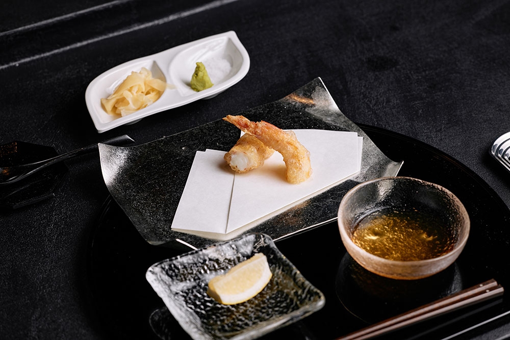 plates of food at +81 Sushi Kappo West End