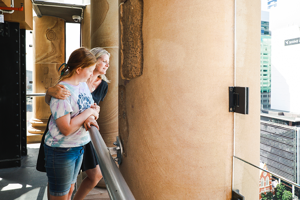 A mum and daughter at the clock tower 
