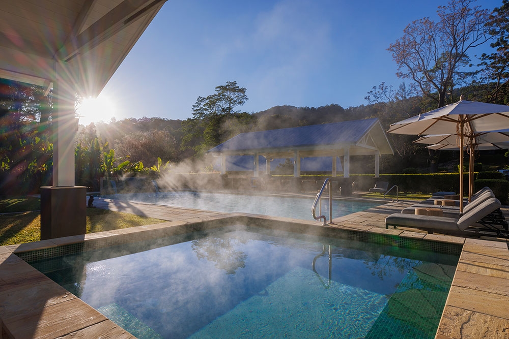 Pool at sunrise with steam coming off it at Eden Health Retreat, Currumbin Valley