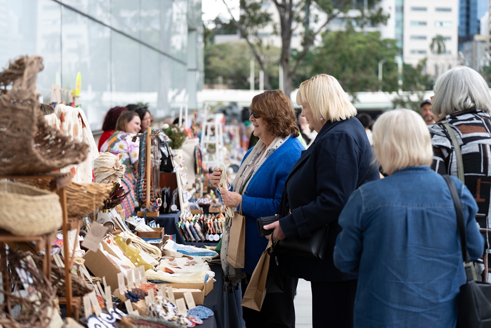 people browsing stall QAGOMA Christmas Design Market