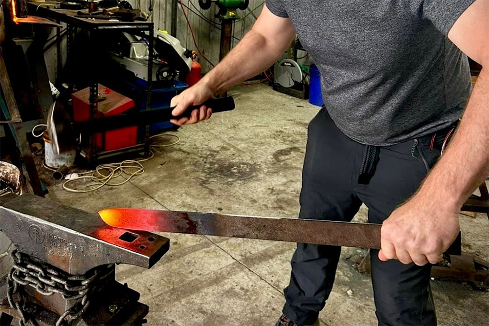 Person blacksmithing NGKnives Gatton