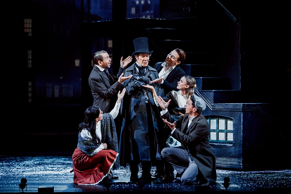 Cast on stage A Christmas Carol