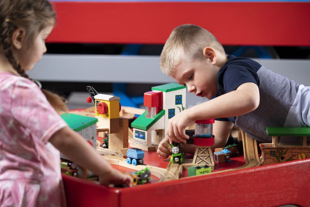 Kids building train sets at Queensland Museum Rail Workshops