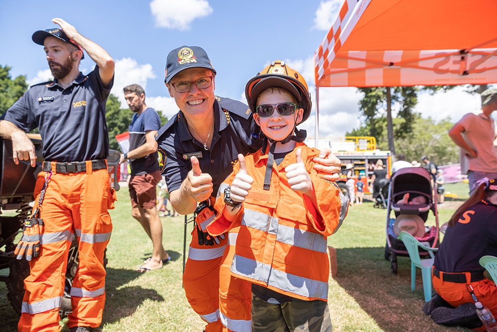 Kids dressed as firemen Moreton Kids Festival