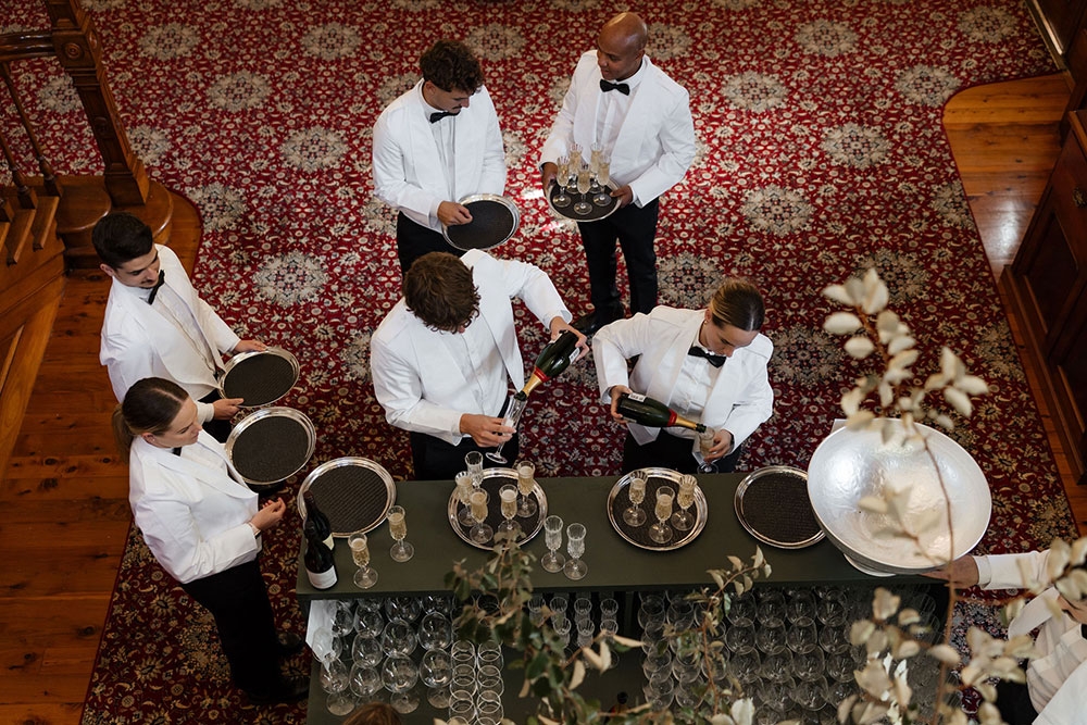 Waiters with trays at Jimbour House
