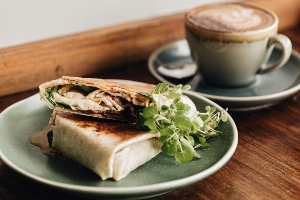 Toasted wrap and cup of coffee at Sassafras of Paddington