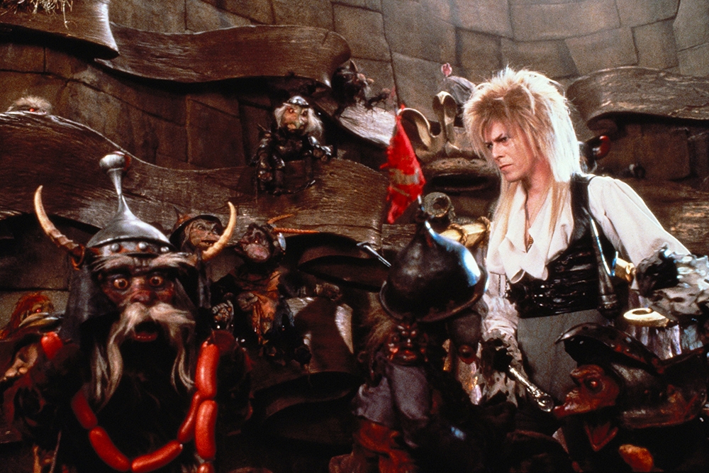 David Bowie in character with puppets in Jim Henson's Labyrinth movie