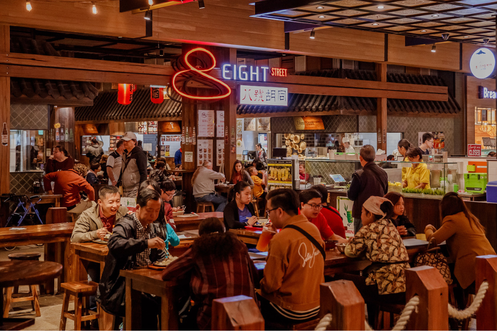 People dining inside 8 Street at Westfield Mt Gravatt
