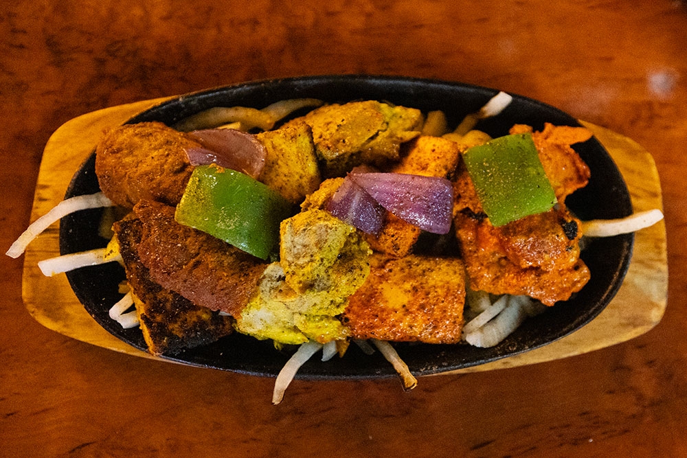 Indian food on a plate at A Night in India Milton