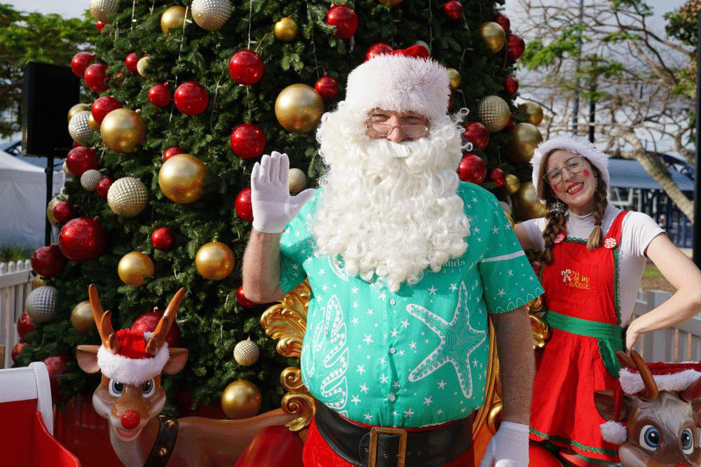 Santa and helper Christmas On Redlands Coast
