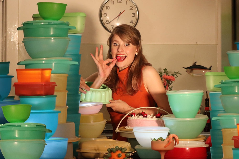 Actor surrounded by Tupperware containers at Airtight show at the Brisbane Anywhere Festival 2026