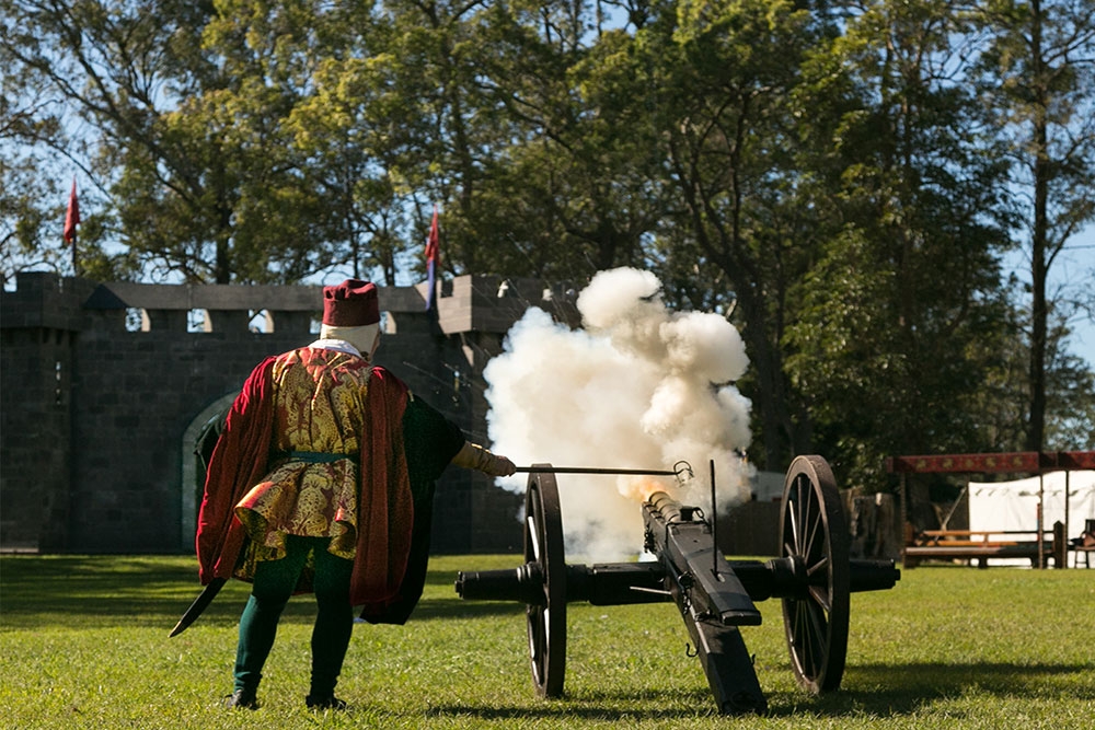 Canon being fired at the Abbey Medieval Festival