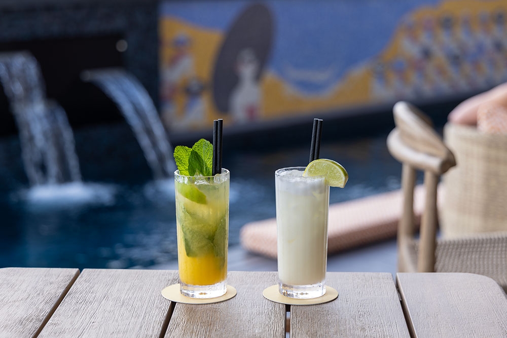 Cocktails on table at Above Rooftop & Bar