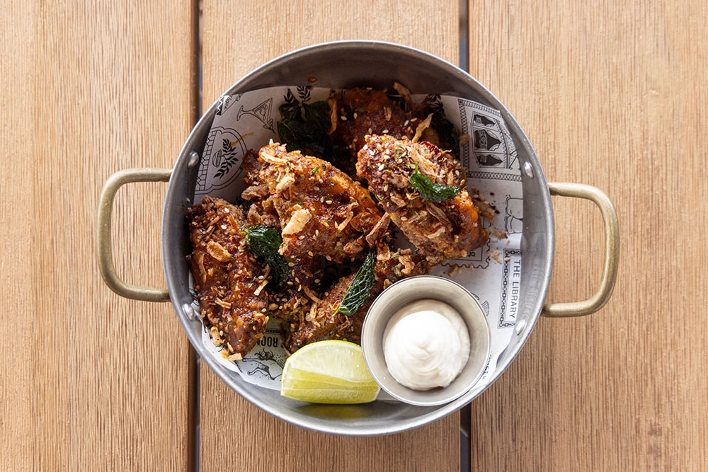 Harissa chicken wings at Above Rooftop & bar