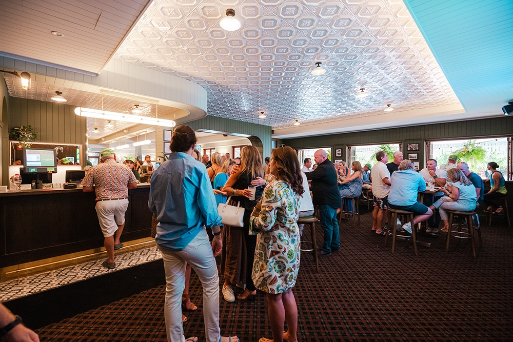 Couple standing at bar in The Imperial Hotel Eumundi