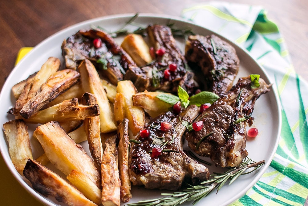 Meat and chips on a plate at Babylon Restaurant & Lounge Moorooka
