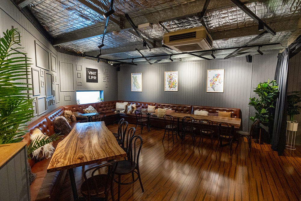 Lounge seating against a wall inside Barrels & Stills Woolloongabba