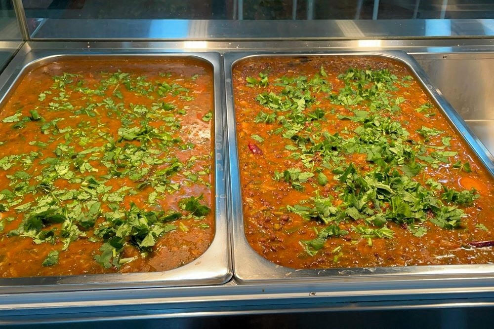 Two large portions of curry at BeeJay's Home Kitchen