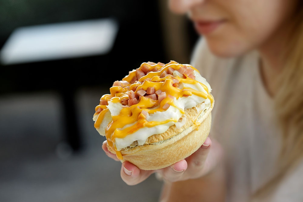 Woman holding Beefy's pie