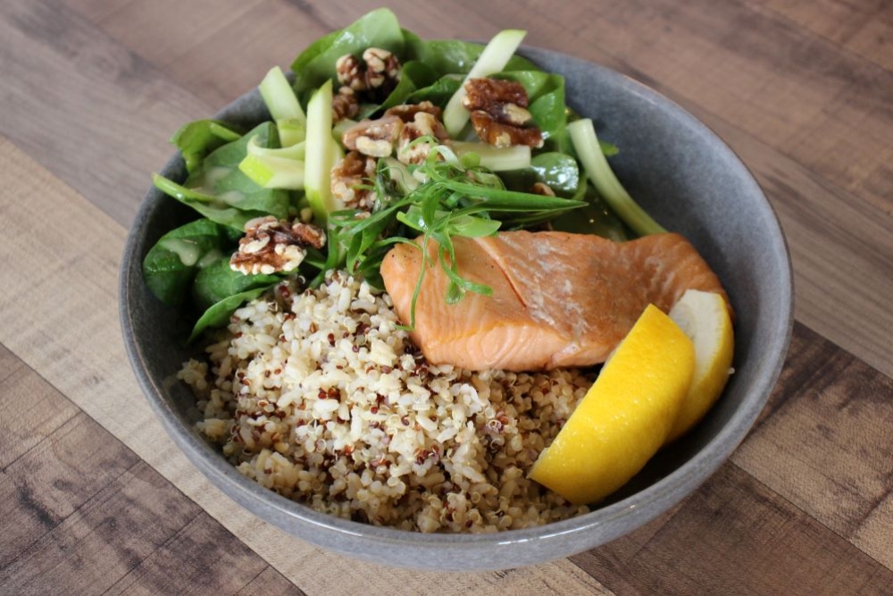 Bowl of quinoa and brown rice with salmon, plus slaw, apple celery salad at Big Buns, Browns Plains 
