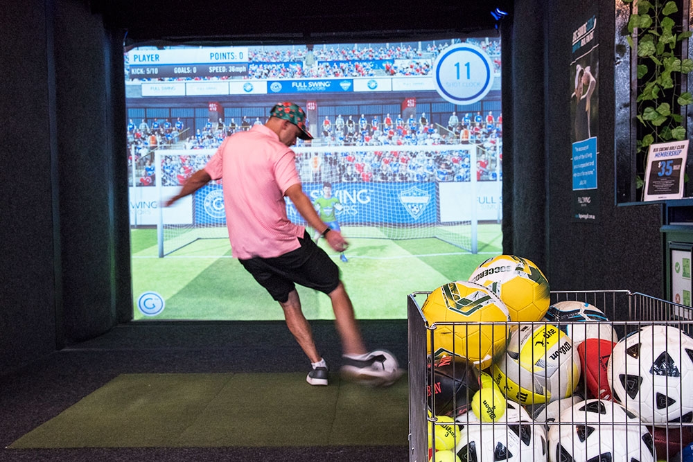 man playing soccer Big Swing Golf