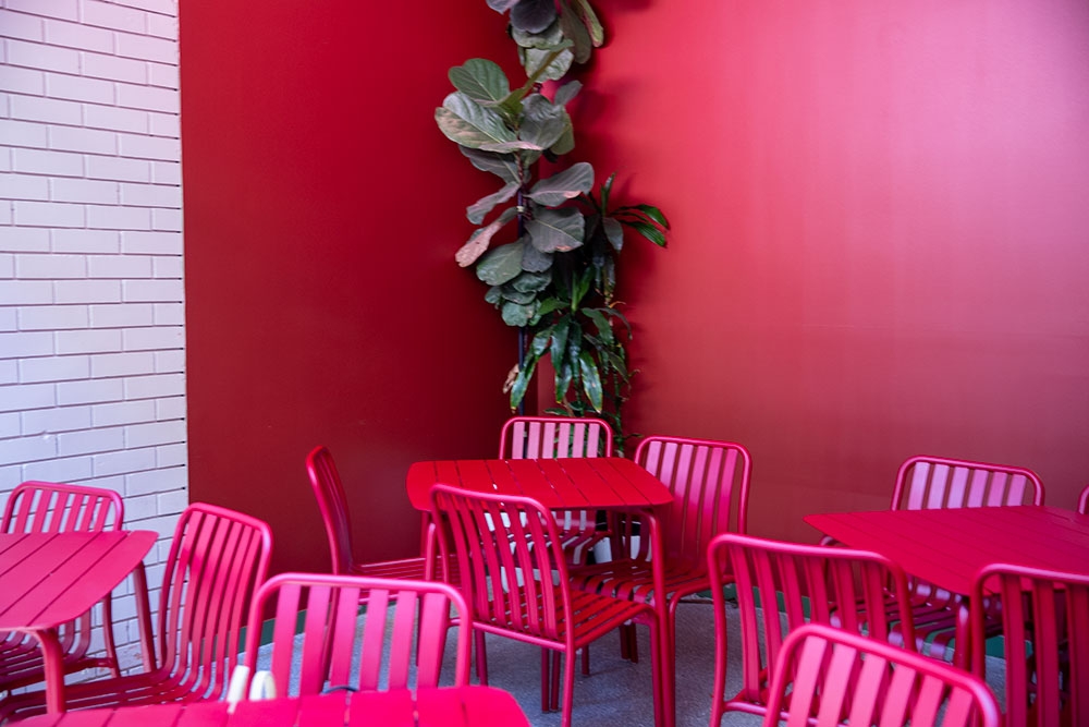 Pink tables and seats at Bobby's Wine Bar & Espresso