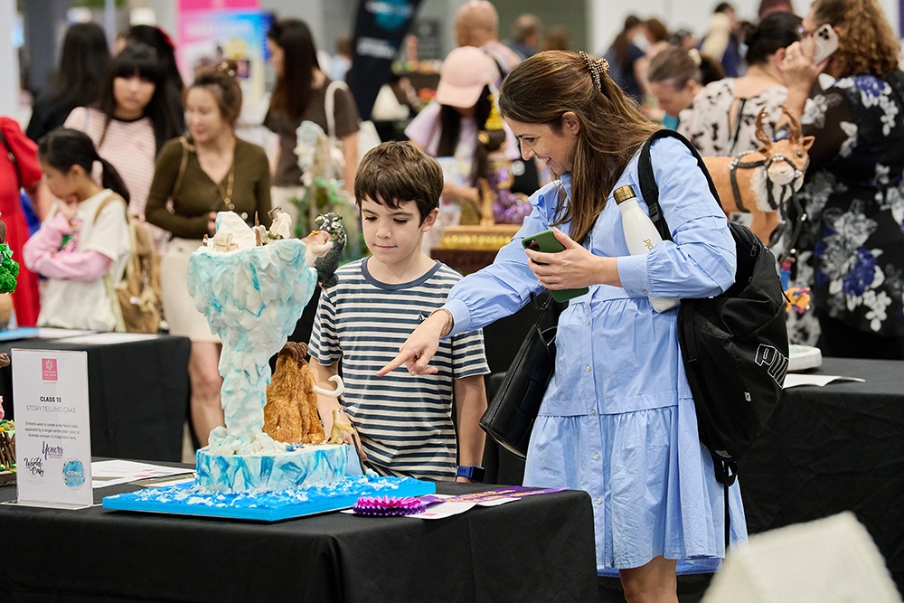 Boy Staring at Comp Entry with Mum