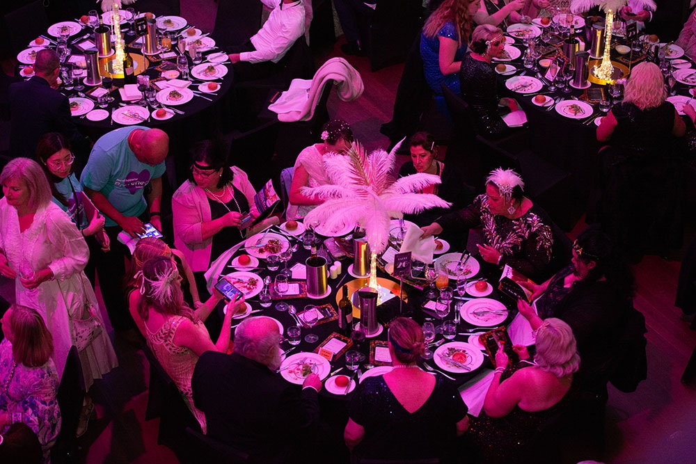 looking down at table at Annual Bravehearts Ball BCEC