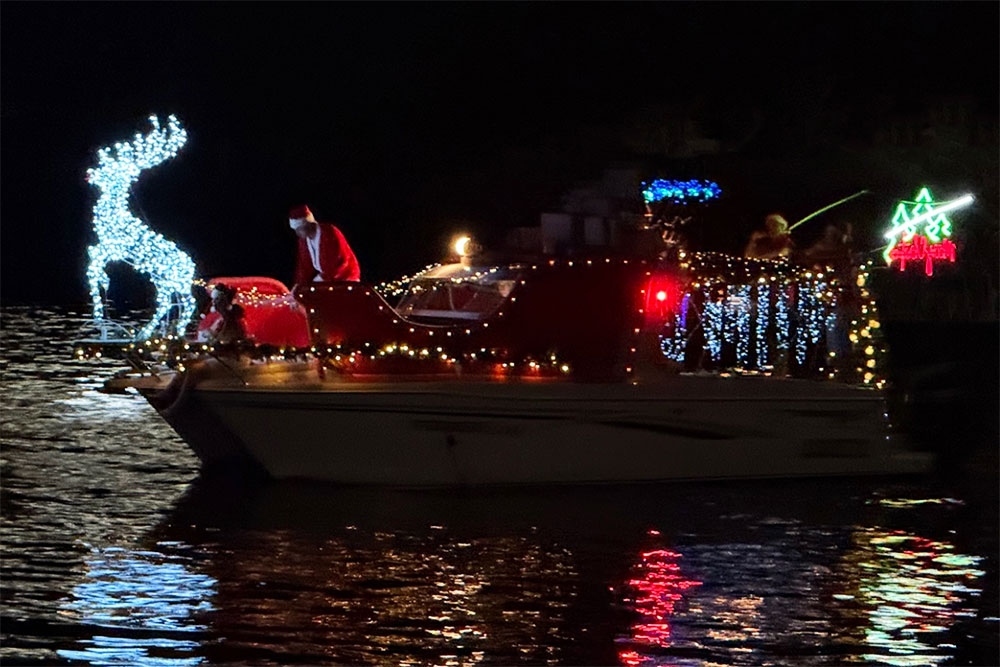 Santa on a lit up boat 