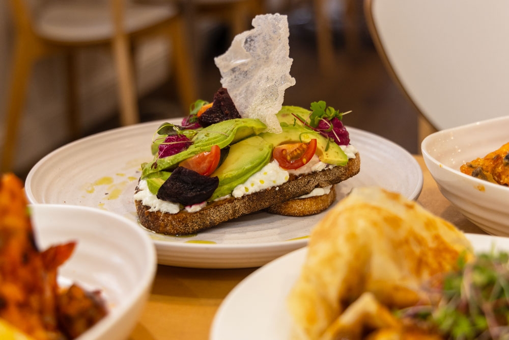 Plates of food, avocado toast, C'sis Espresso Bowen Hills 