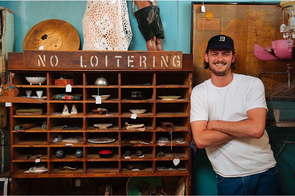 Person inside Empire Revival Antique Collective